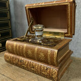 Liquor cellar in false pretence of stacked bound books