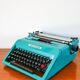 Olivetti typewriter, Studio 45, Electric Blue, with accessories, 1970