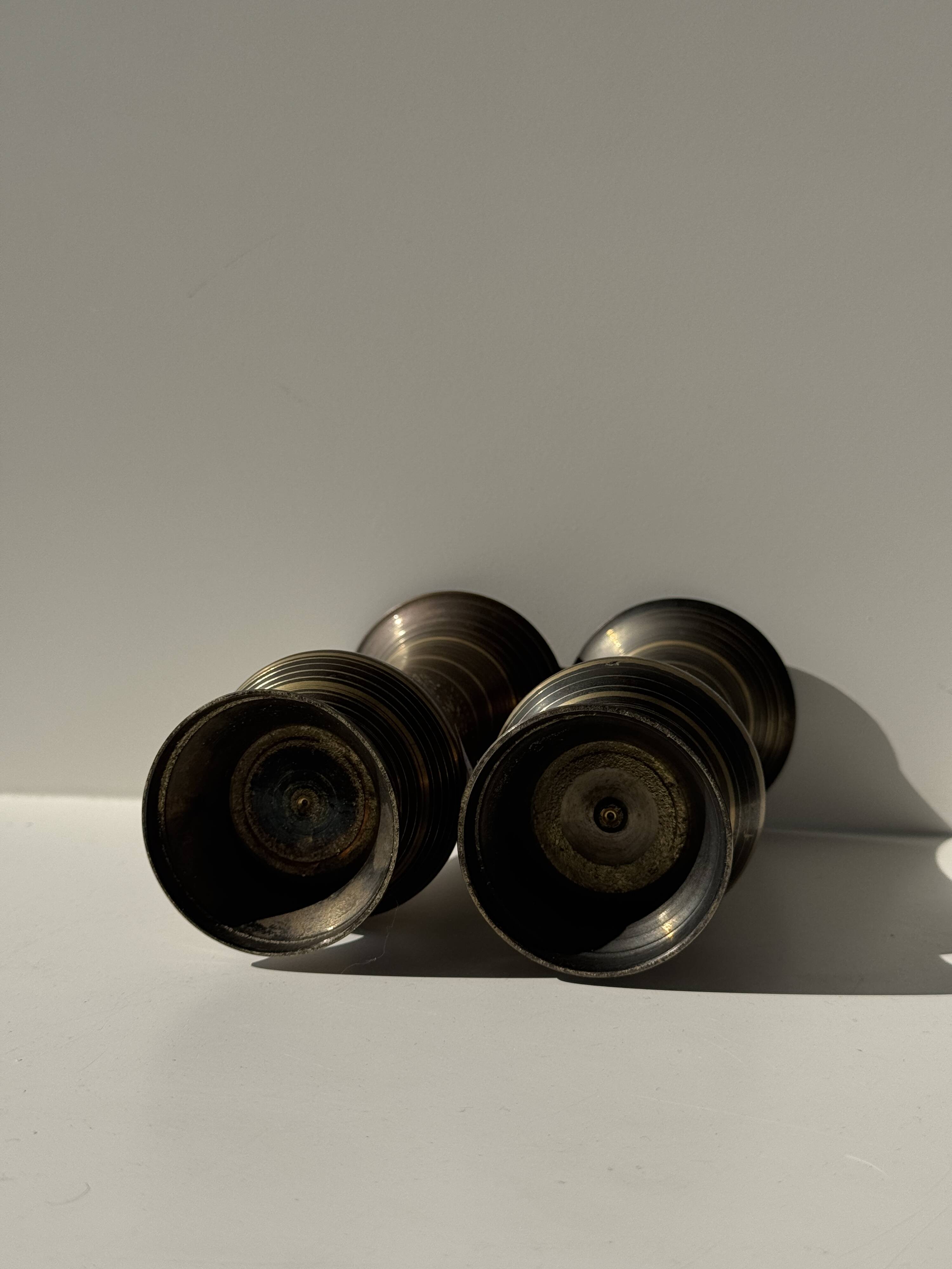 Pair of two small chiseled metal vases H15.5 D6.5