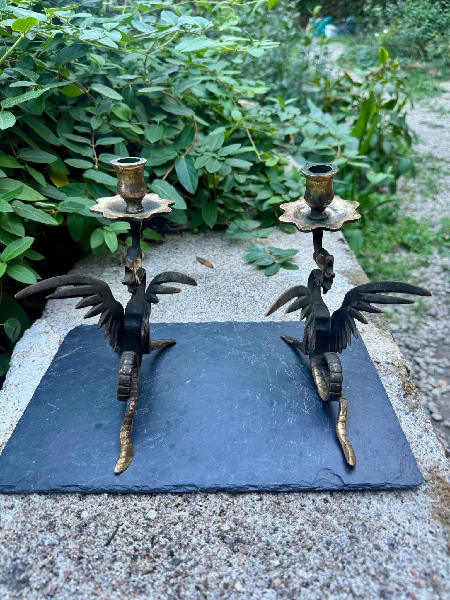 Pair of chimera candle holders in bronze, 19th century.