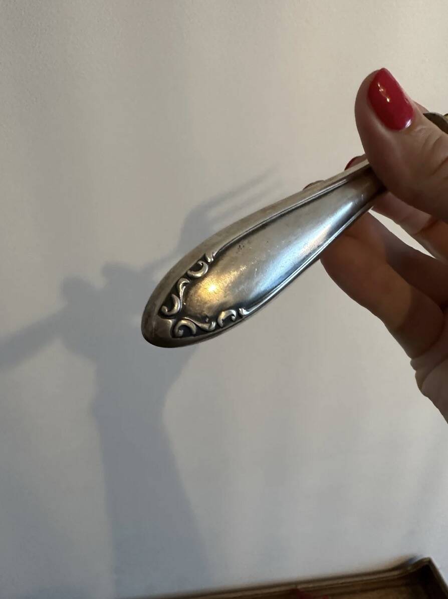 Engraved meat fork in silver and gold metal