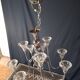 Chandelier from the 1930s to 1950s in chrome metal and thick glass.