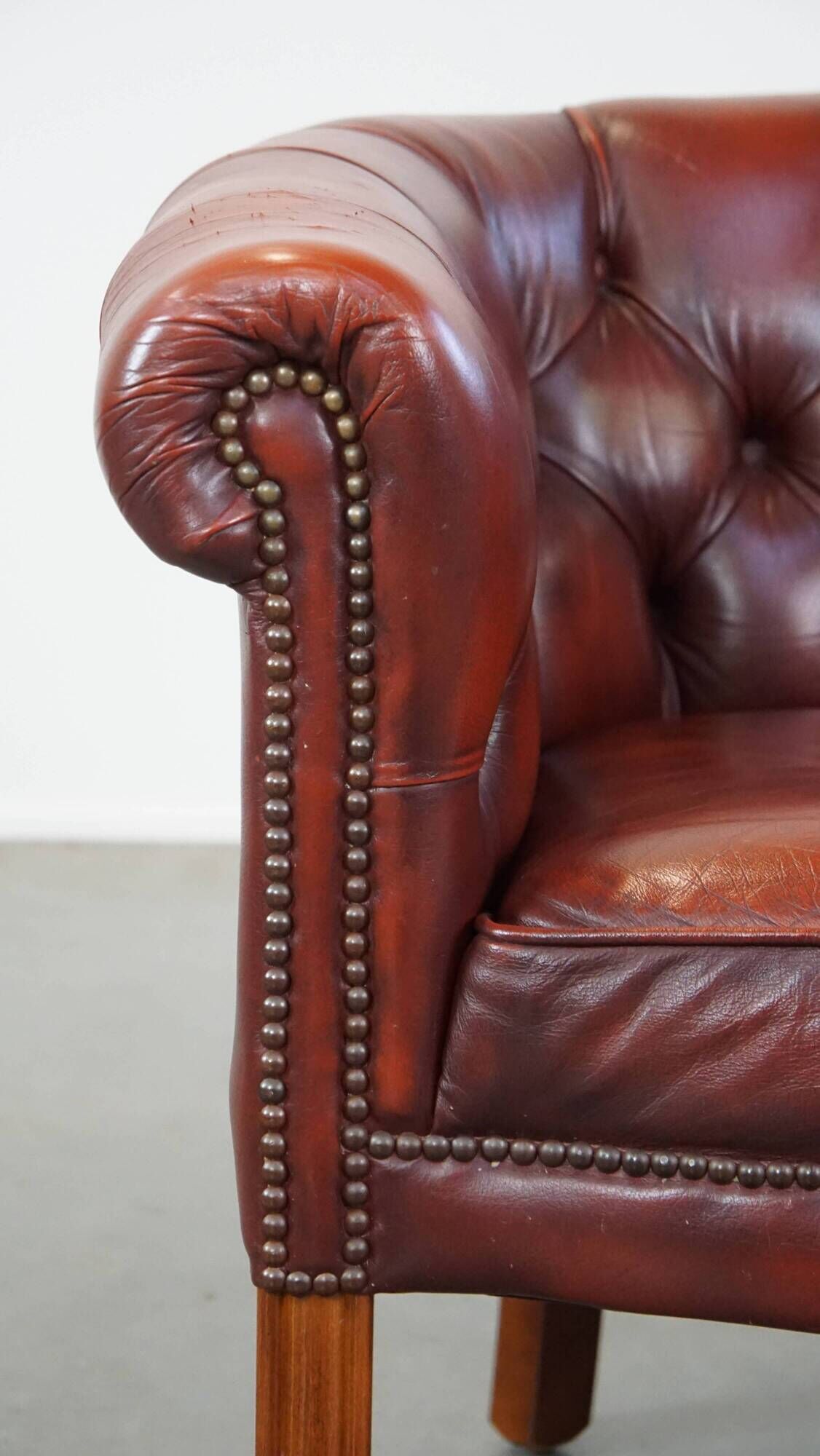 Red cow leather English chesterfield club chair
