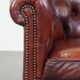 Red cow leather English chesterfield club chair