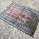 Vintage Anatolian prayer rug made of hand-knotted wool.