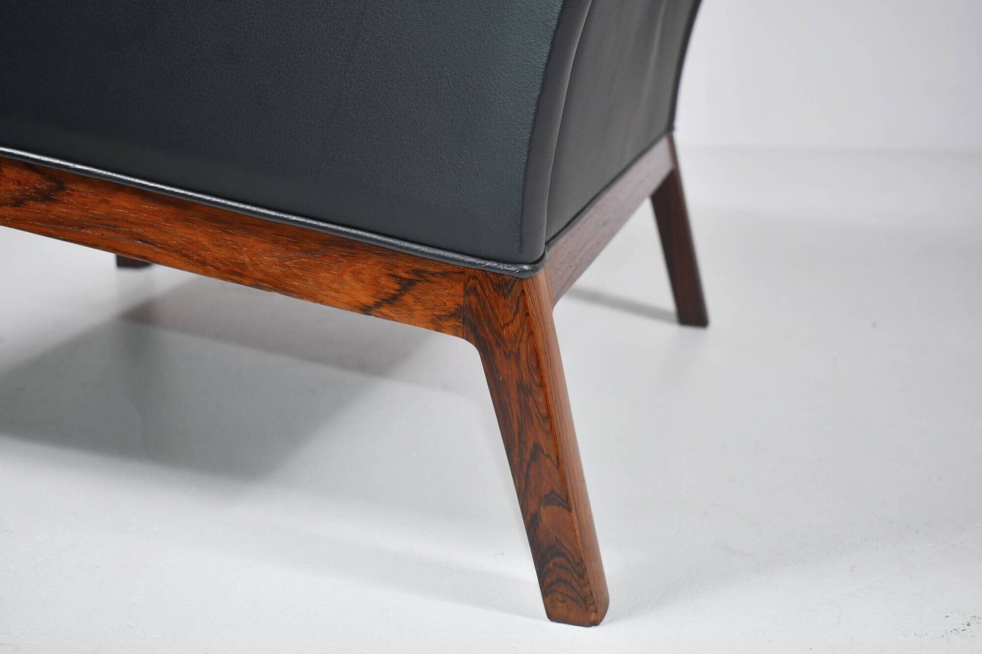 Leather and rosewood armchair by Kai lyngfeldt-Larsen. Denmark