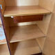 Vintage wardrobe with shelves and lacquered interior mirror.