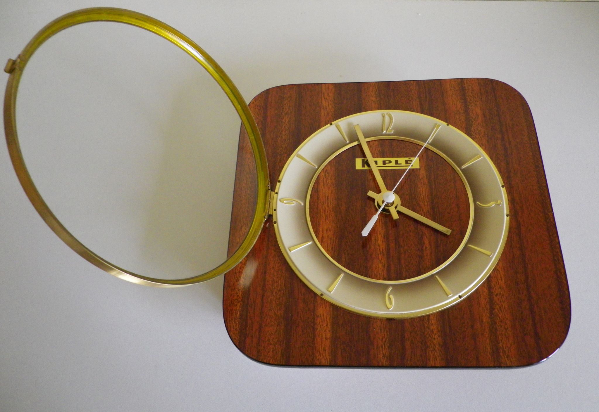 Clock in mahogany formica, metal, wood, glass, in its original box - Brand KIPLE - 70s