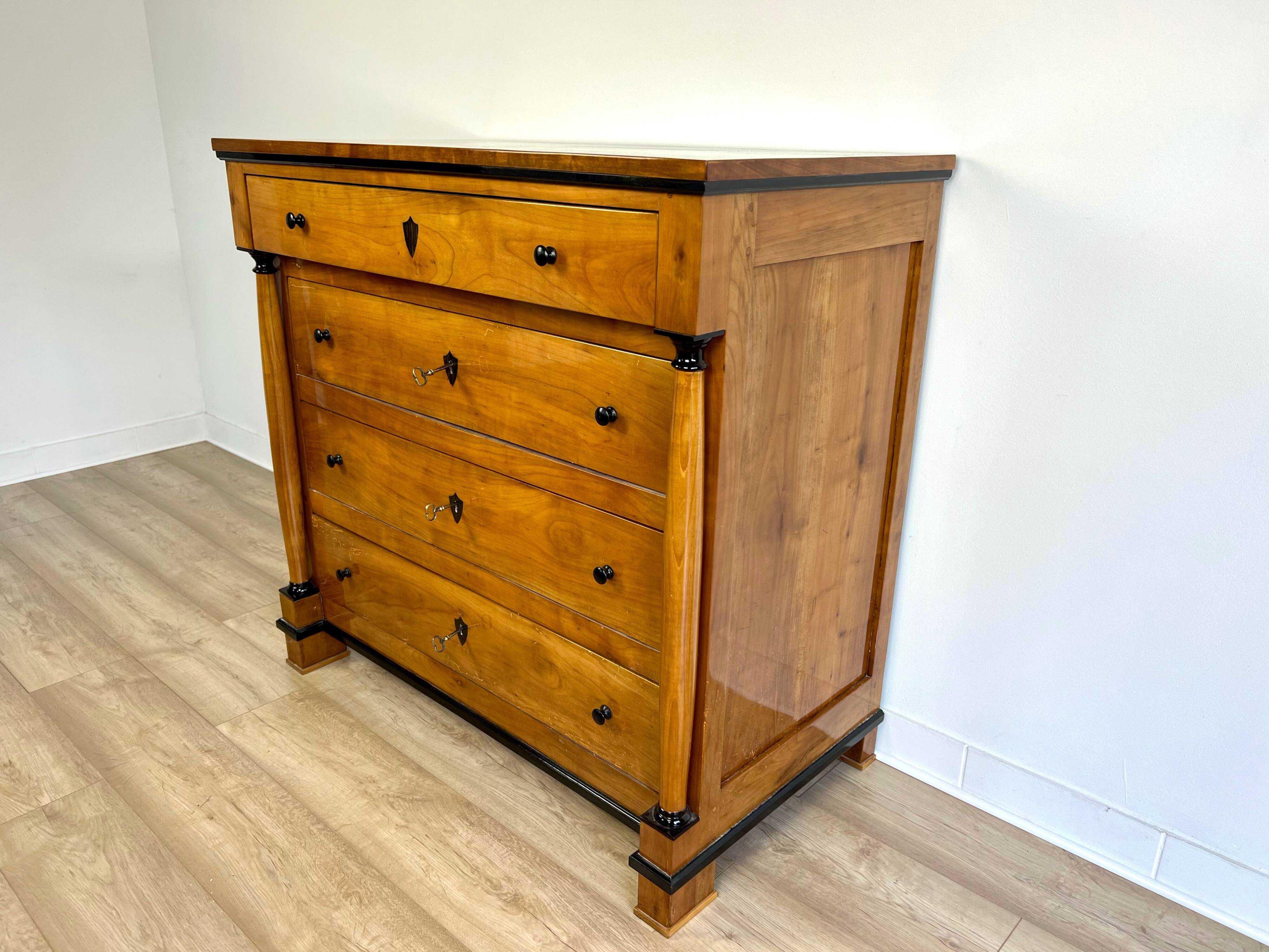 Original Biedermeier chest of drawers after renovation - 19th century - cherry, glossy finish.