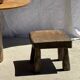 Small stool, square solid teak side table with a curved seat.