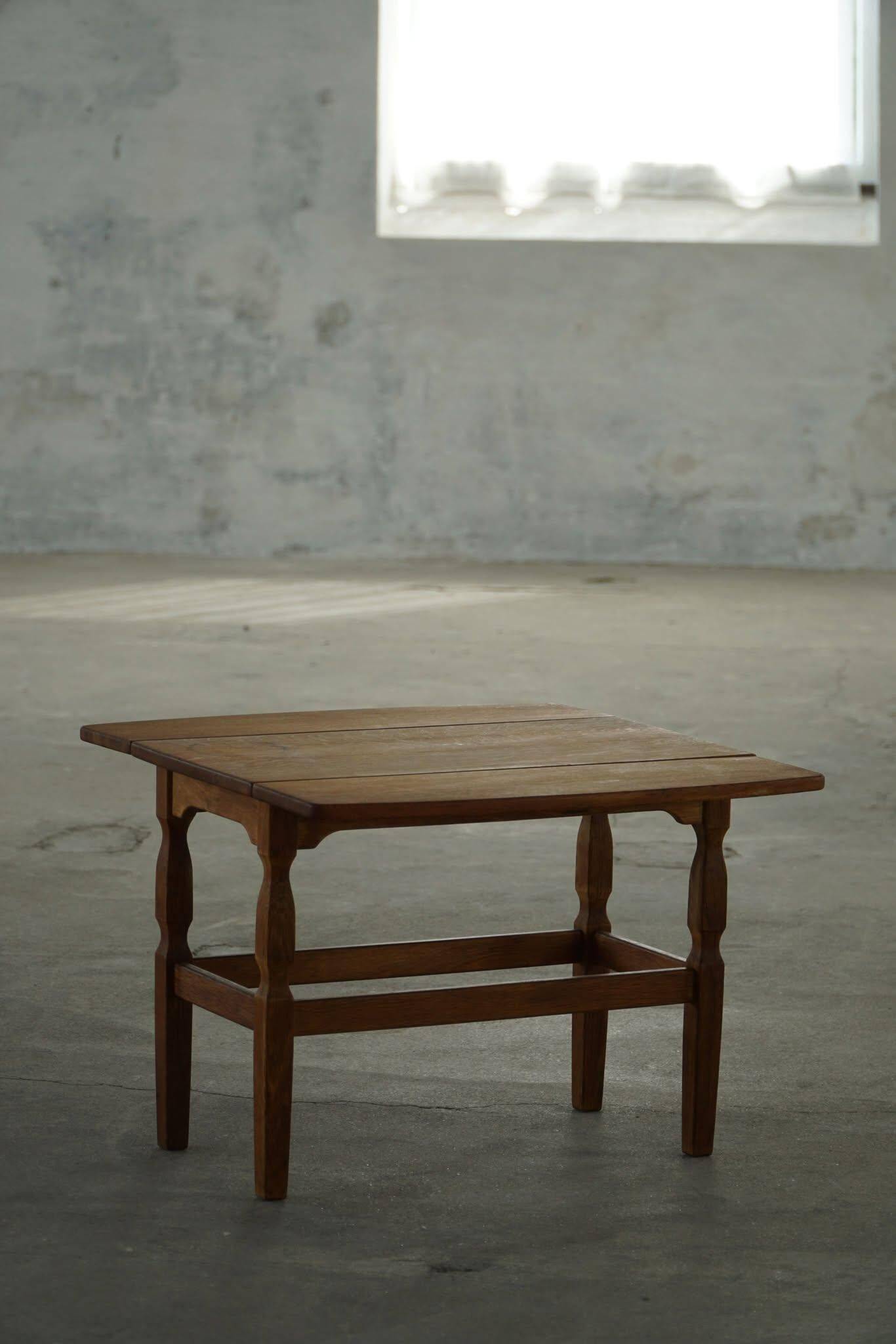 Modern Danish folding side table in solid oak, mid-20th century.