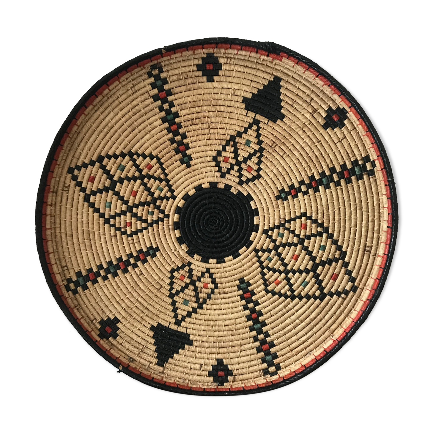 Braided wicker dish with ethnic motifs