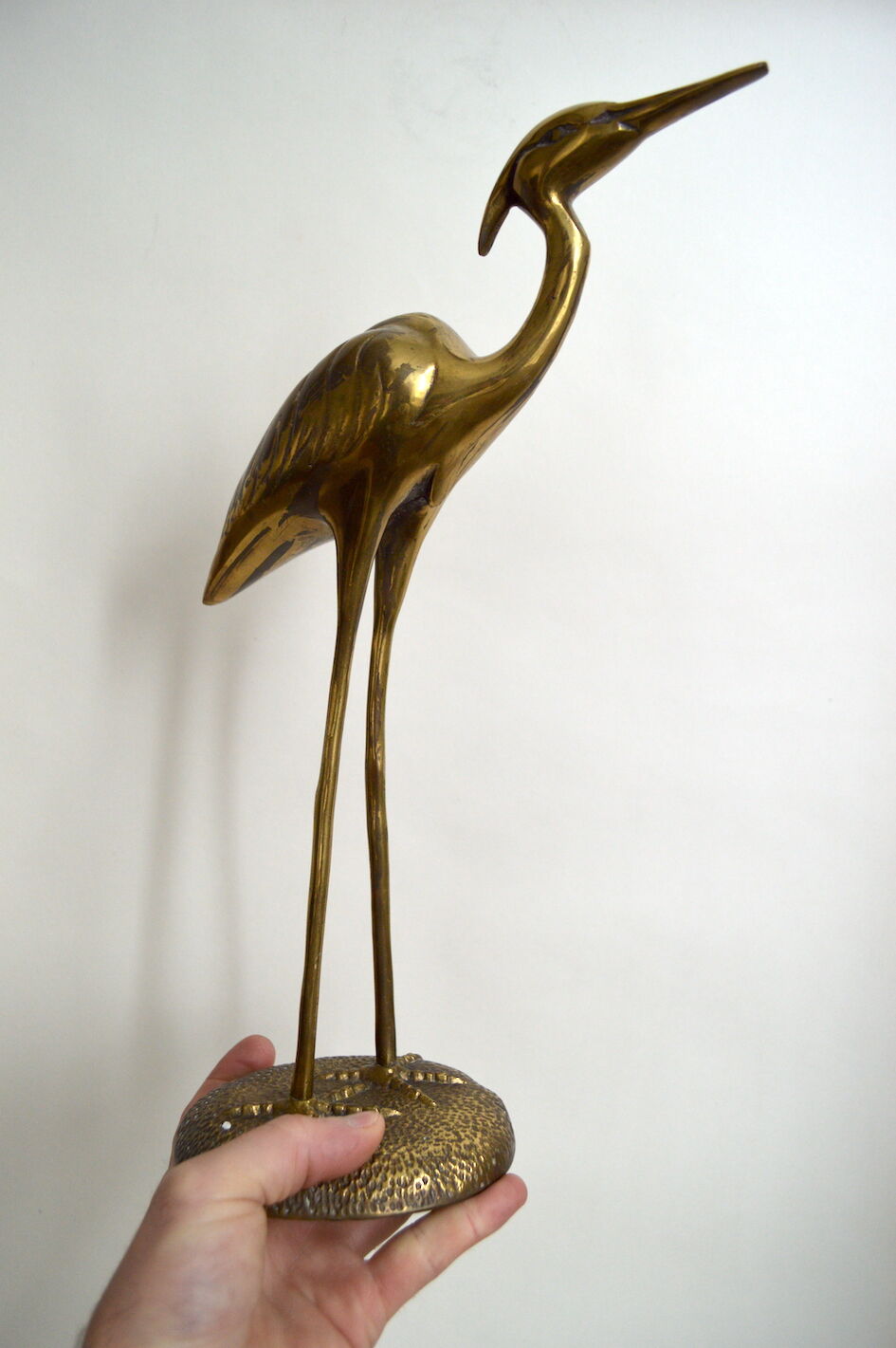 Brass herons couple
