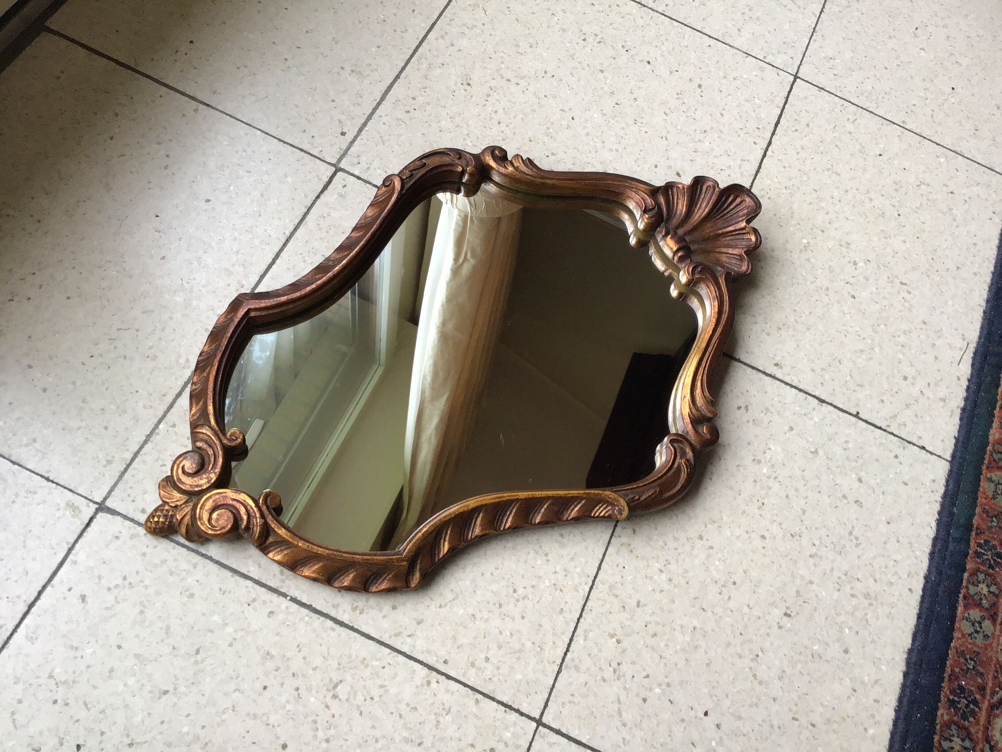 Old baroque rock mirror.
