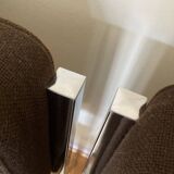 Pair of brown low chairs with chrome base