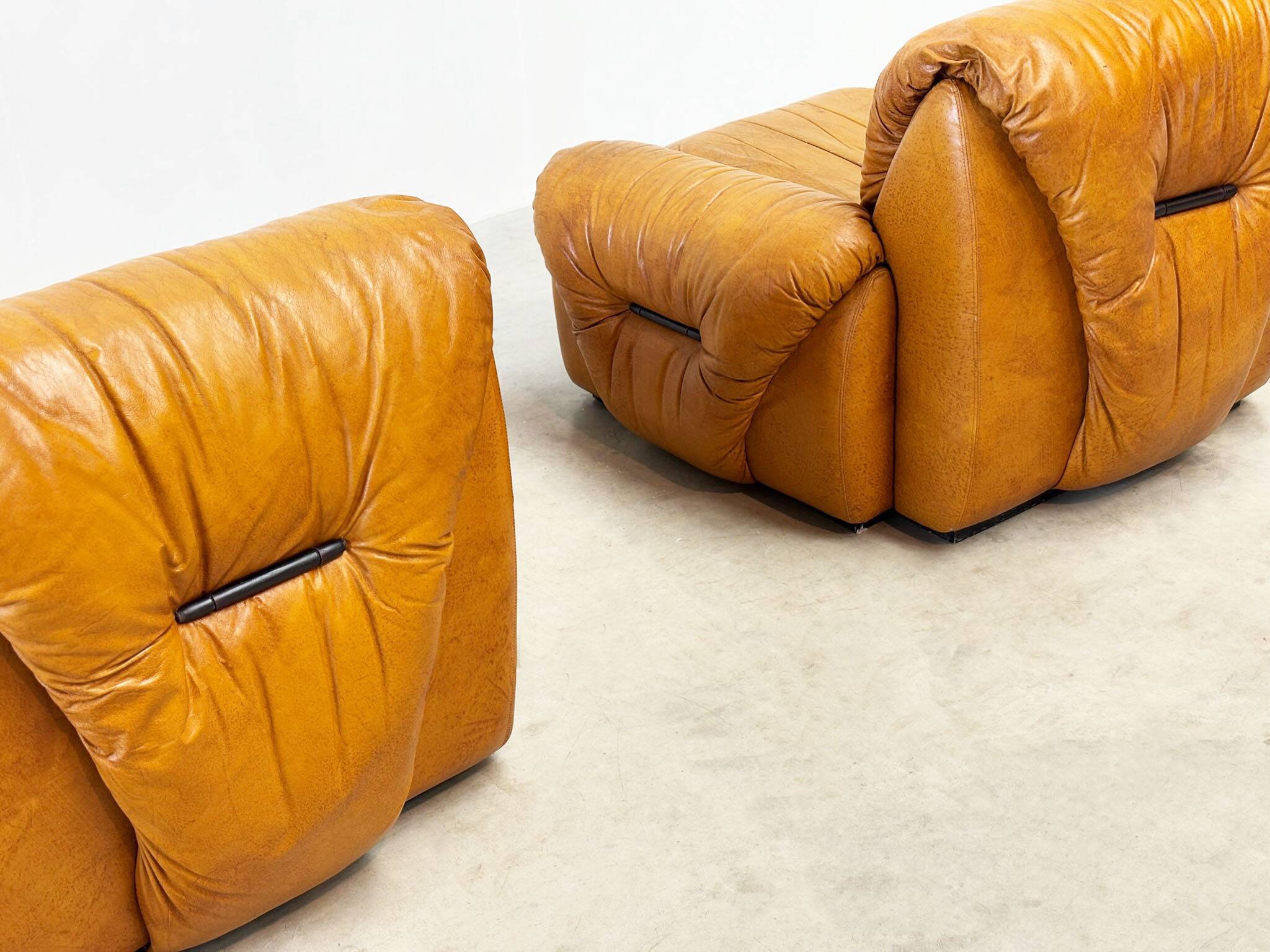 Set of two Italian cognac leather lounge chairs