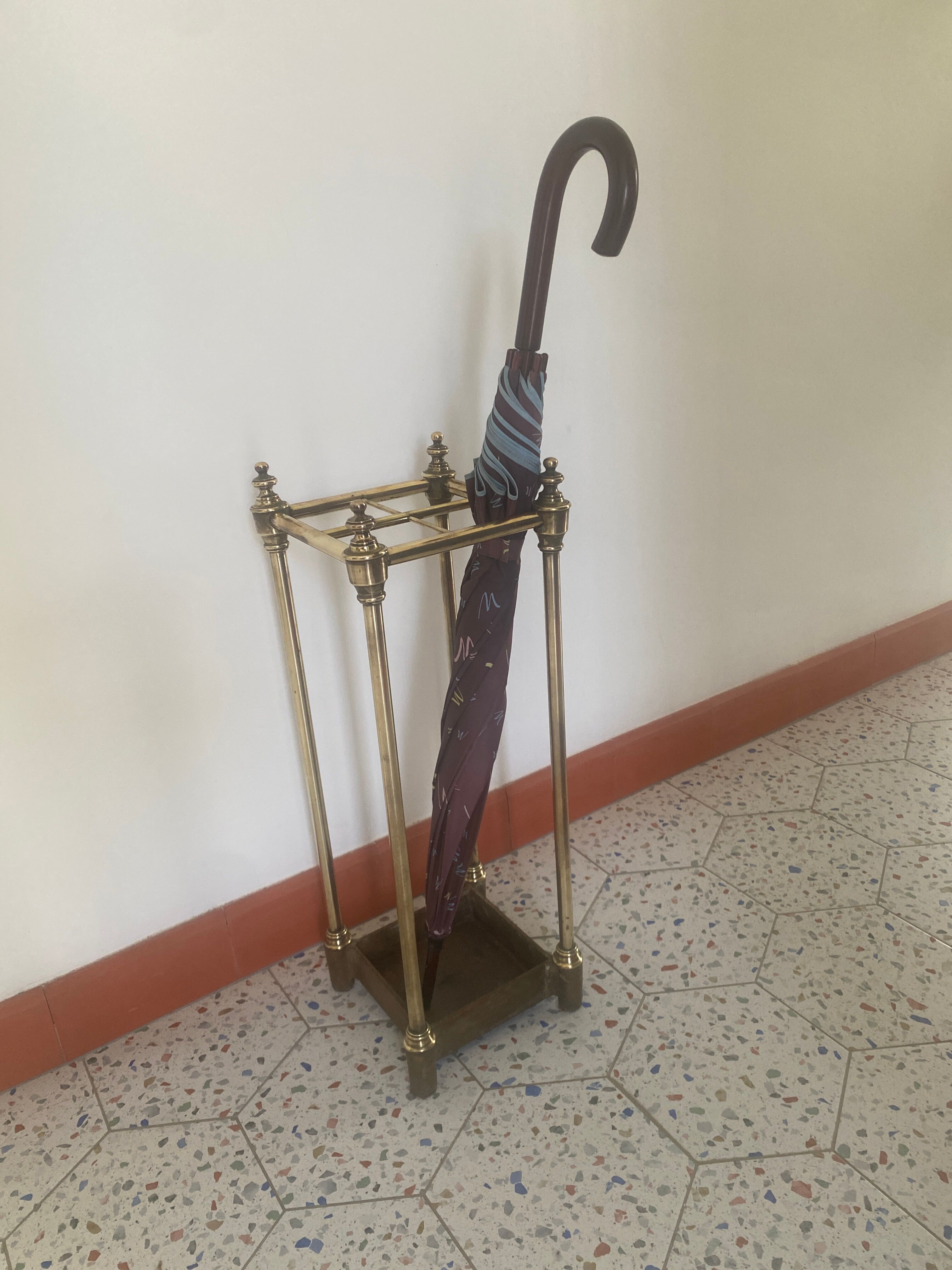 Brass and cast iron umbrella door