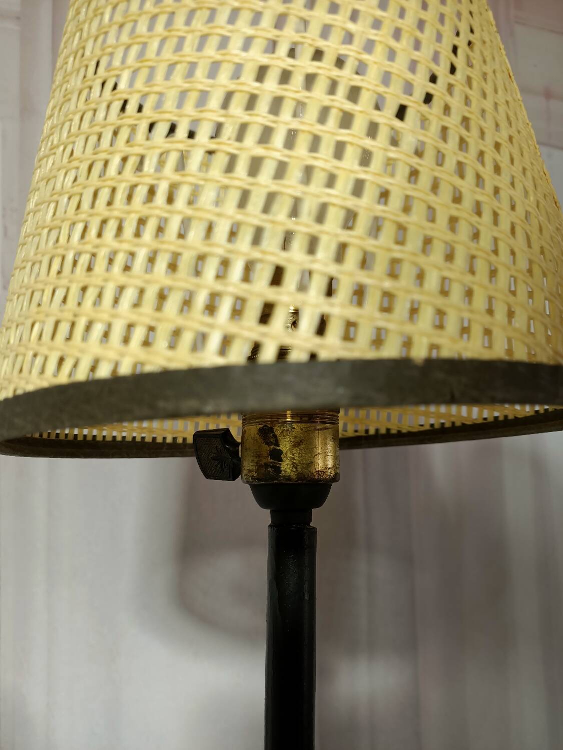 Mid-century tripod floor lamp with 3 lights and a yellow shelf.