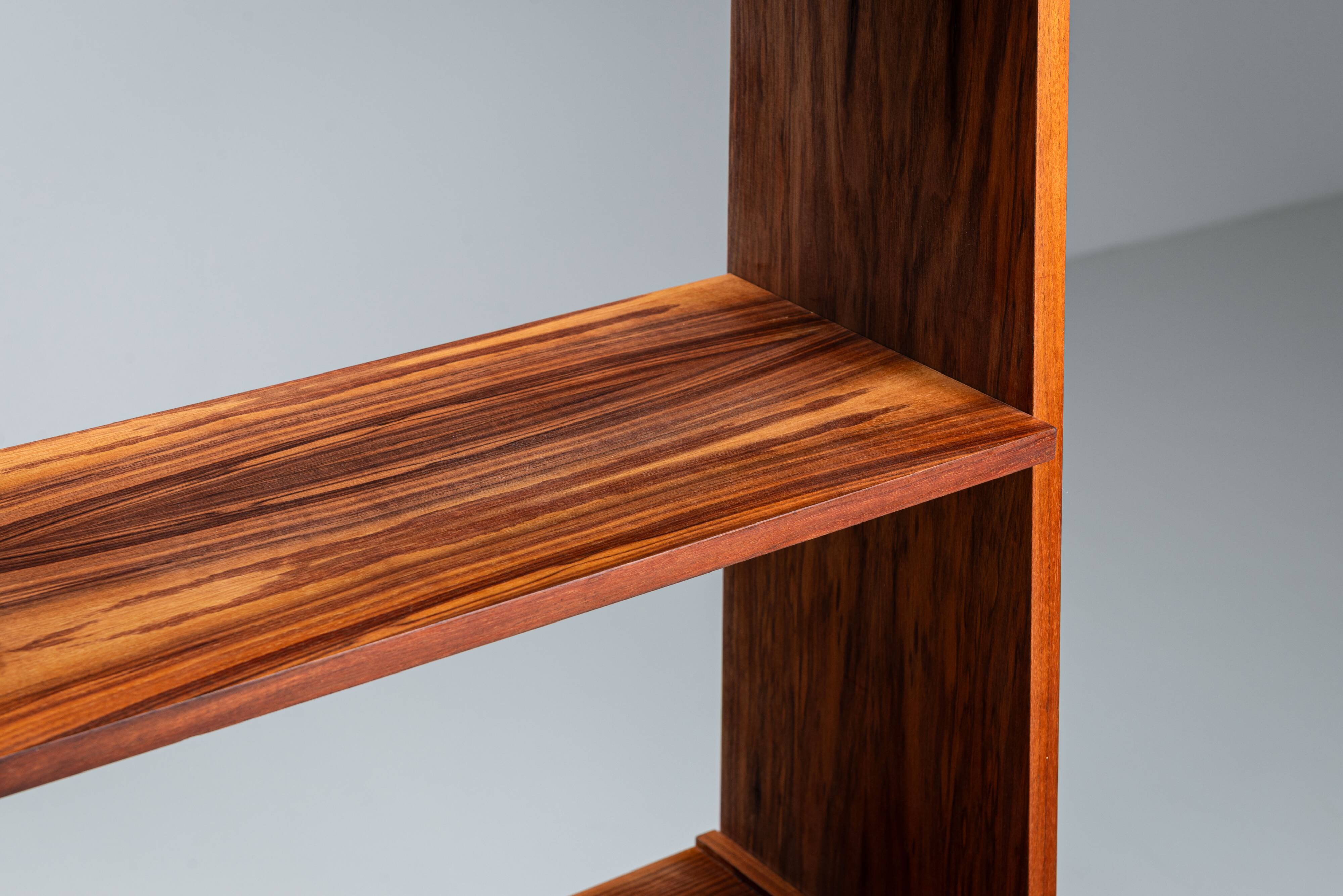 Italian bookcase with three shelves and storage