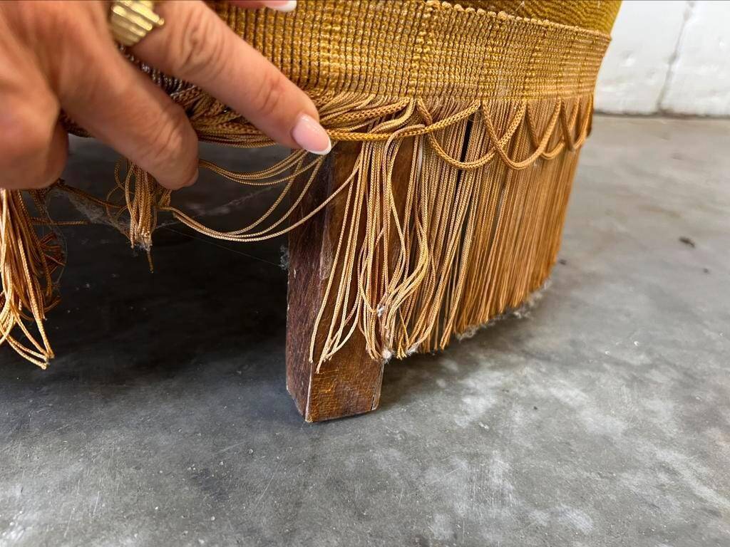 Vintage one-seater armchair with fringes