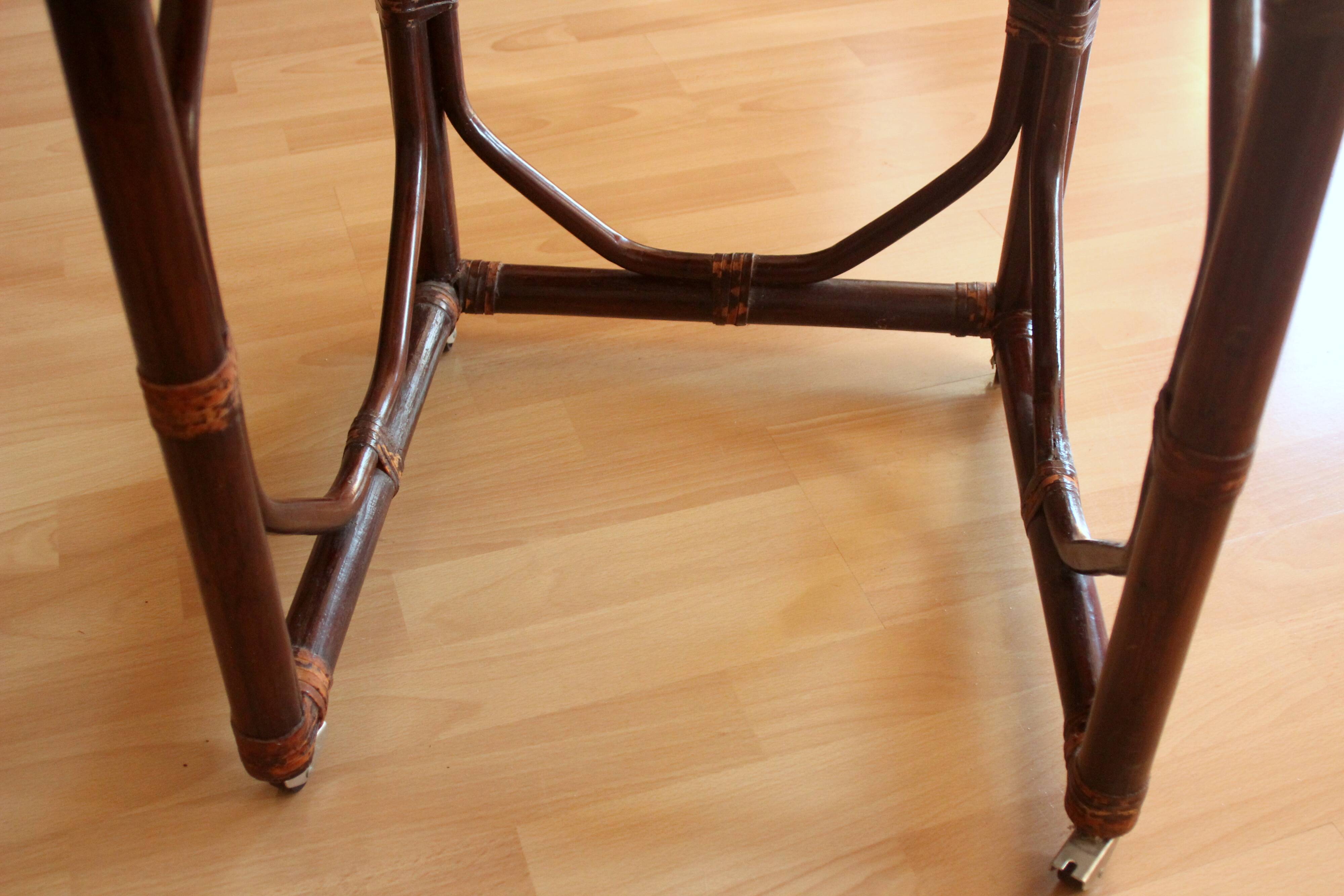 Small side table on rolls made of rattan, bamboo and wood, handmade Vintage