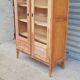 Armoire pied compas en chêne blond