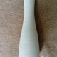 White ceramic vase with fine streaks