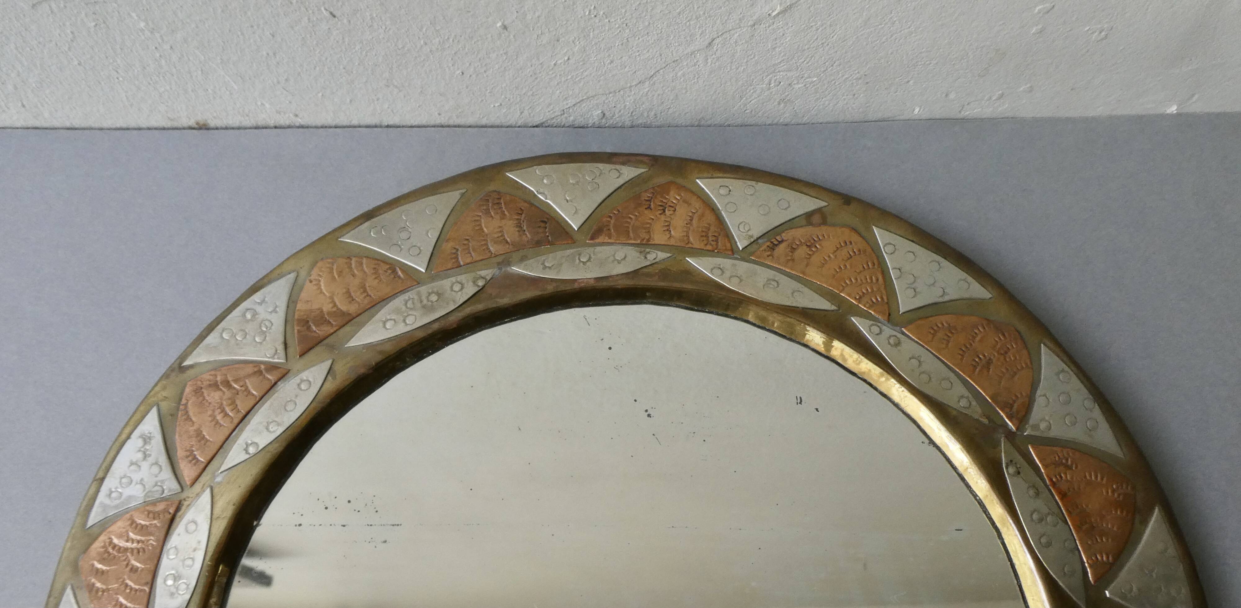 Moroccan mirror in chiseled brass, copper and silver, 70s-80s
