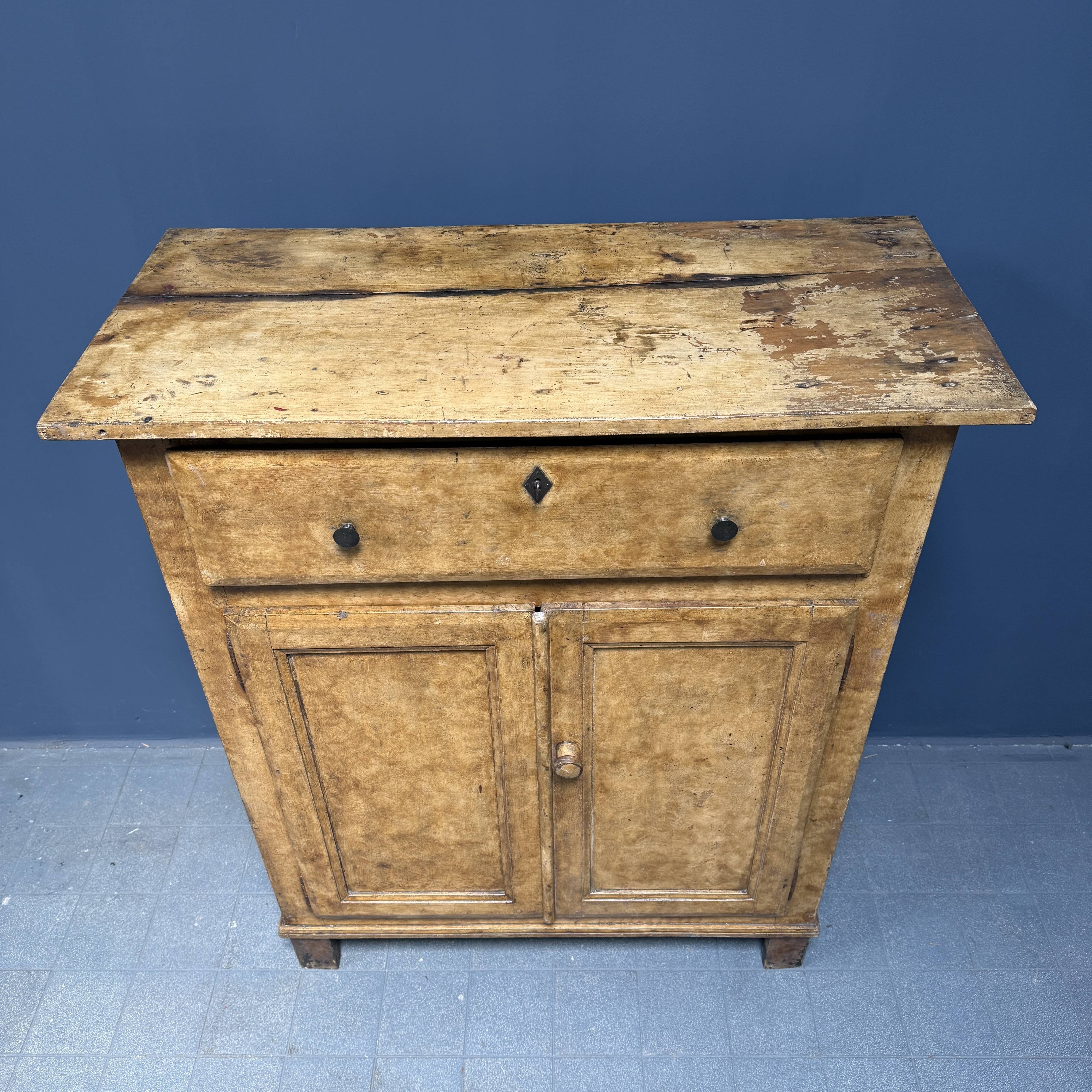 Old marbled ochre yellow French farmhouse cabinet