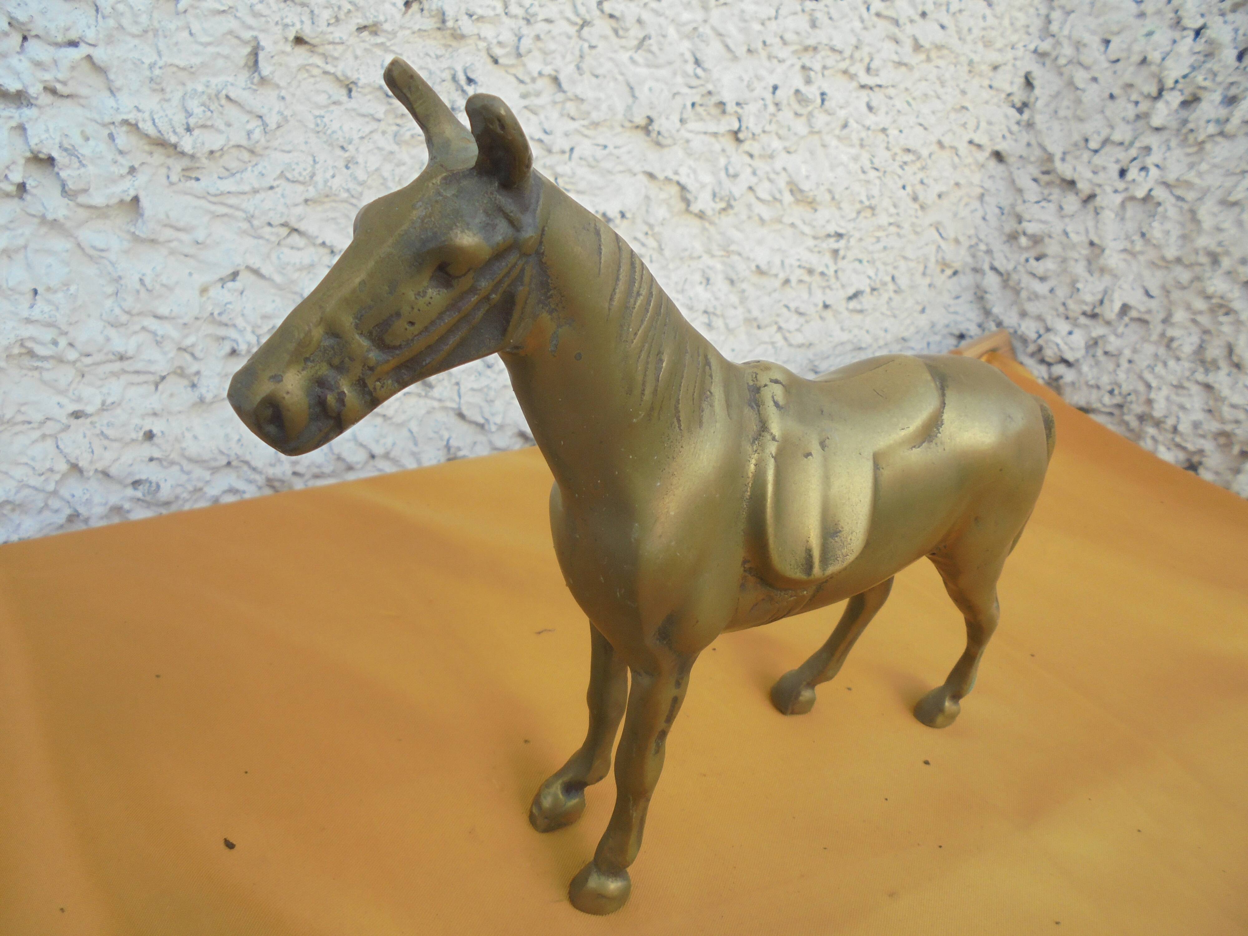 Brass saddled horse