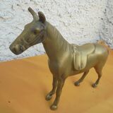 Brass saddled horse