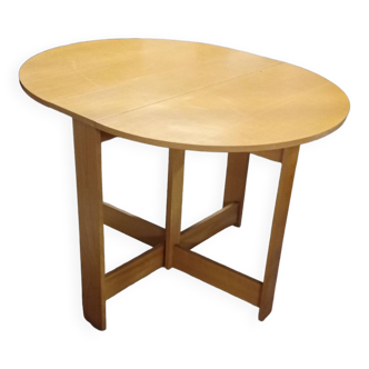 Foldable oval wooden table