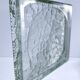 Two designer glass paving pockets