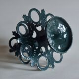 Old enameled cast iron egg display.