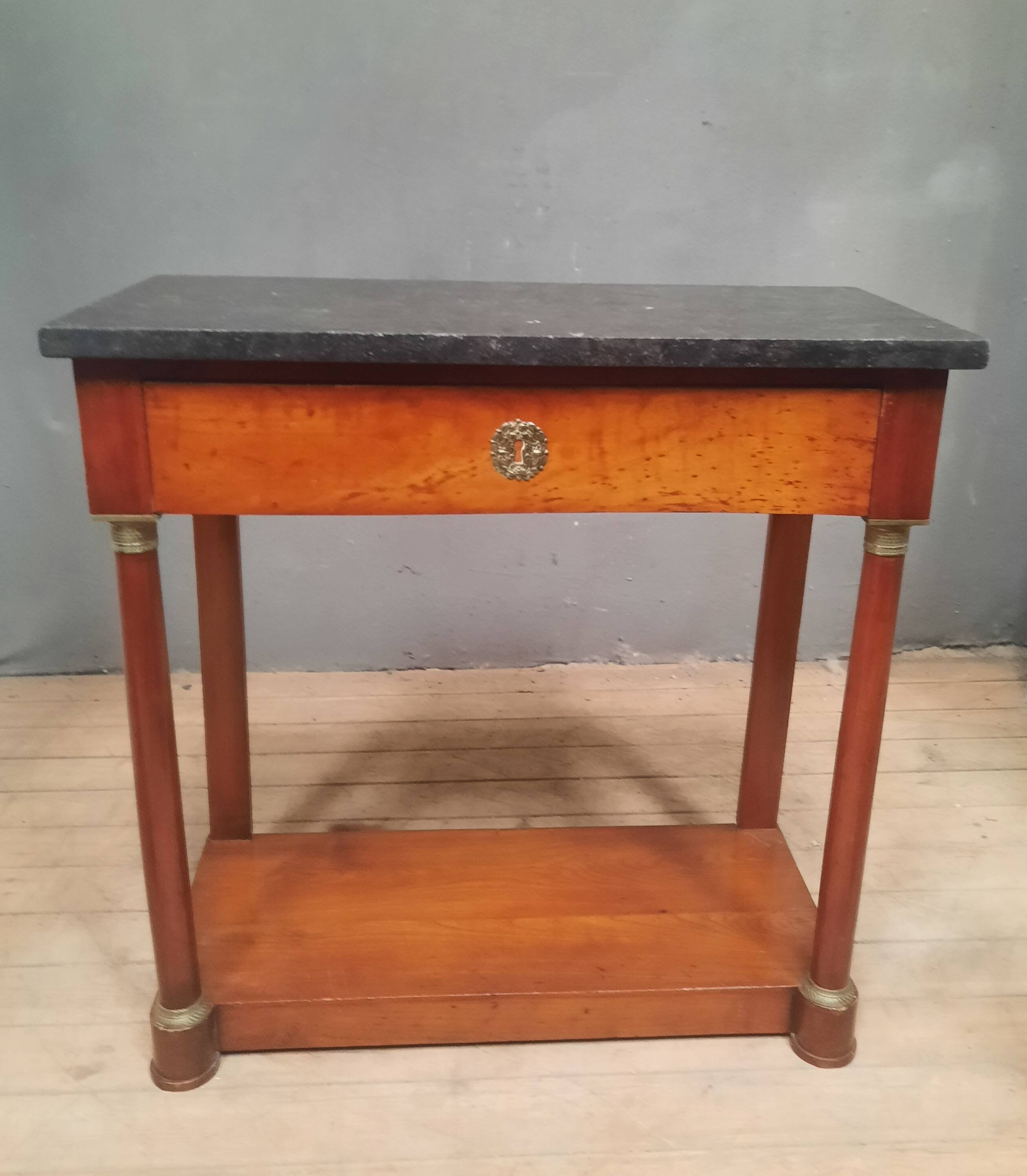 Empire period marble top console table