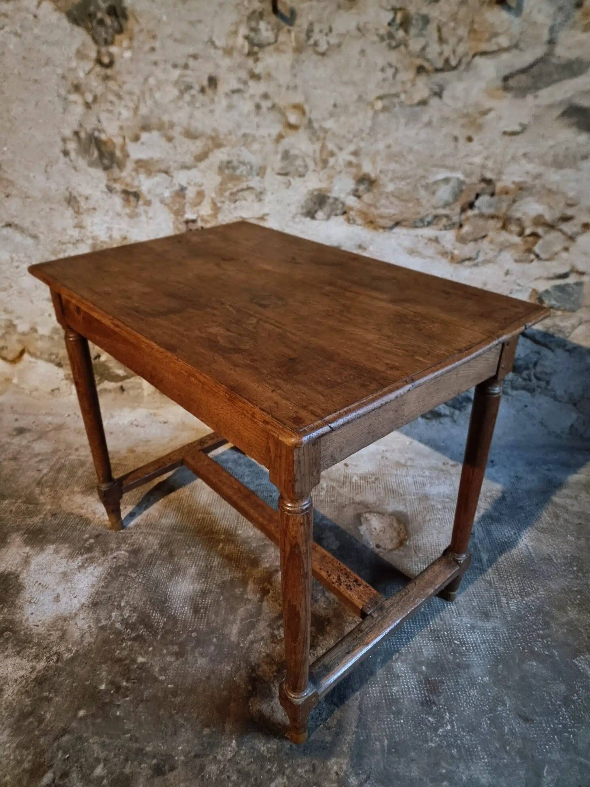 Antique French oak table, writing table from the early 19th century.