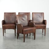 Set of 4 nicely finished dining chairs/side chairs with armrests made of cowhide leather
