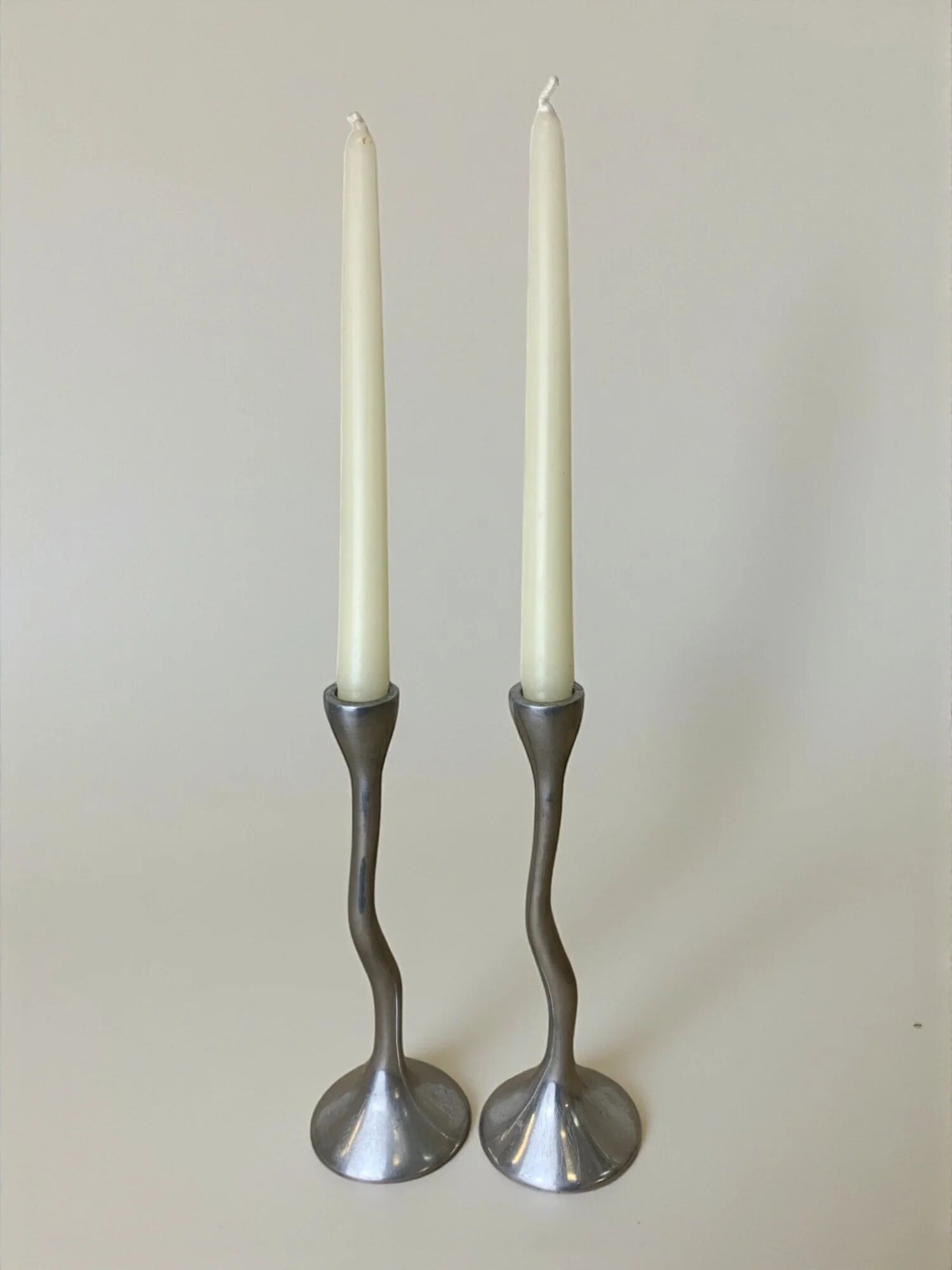 Pair of zigzag candlesticks, solid aluminium, Spain, circa 1980s