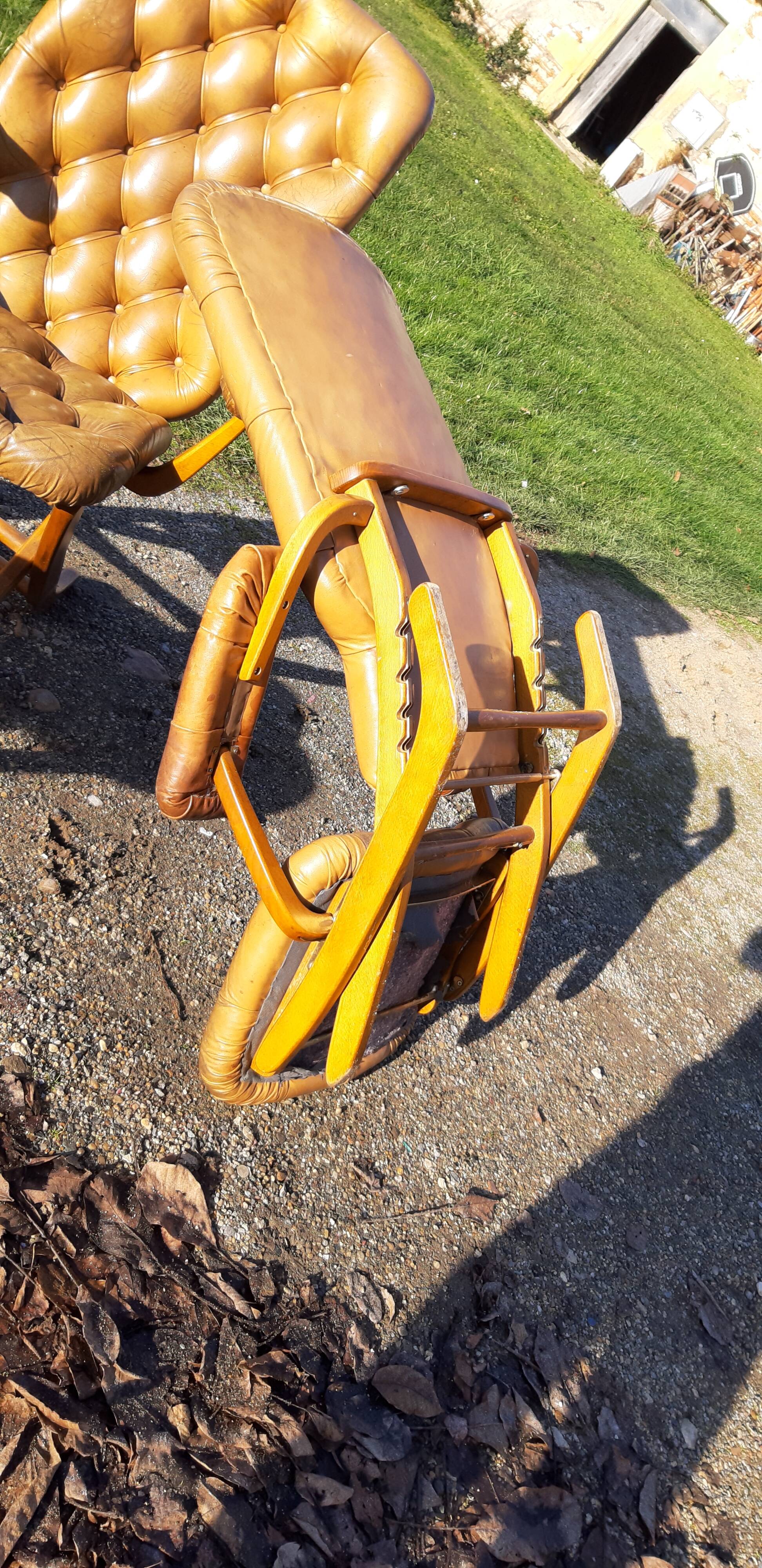 Pair of chesterfield style leather armchairs