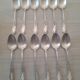 Box of 12 small old spoons in silver metal