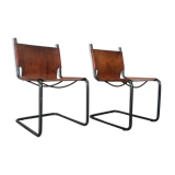 pair of tubular chairs in tawny leather