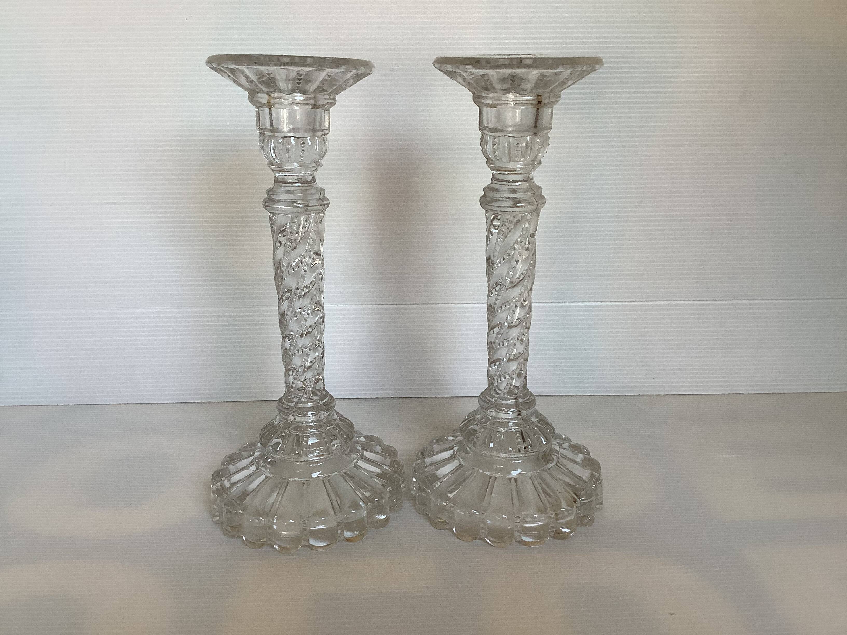 Pair of old twisted candlesticks with diamond tips.