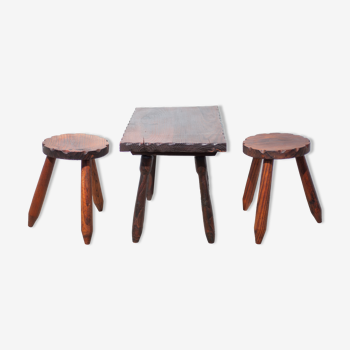 Set of coffee table and 2 carved wooden stools, brutalist