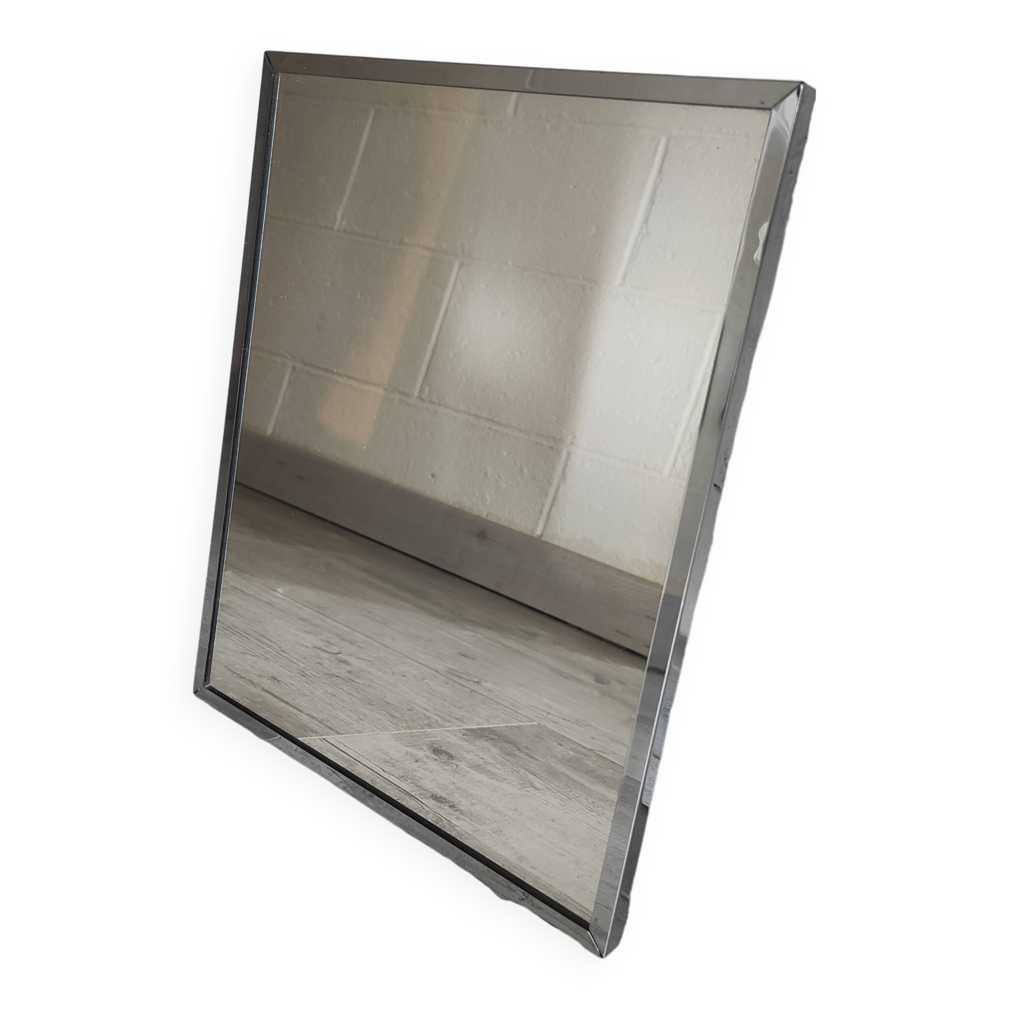 Vintage mirror with silver metal frame to hang