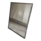Vintage mirror with silver metal frame to hang