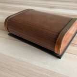 Cigarette box with sliding curtains