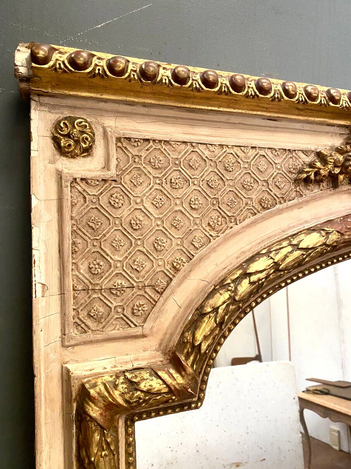Louis XV style mirror in wood and gilded and patinated stucco 19th century