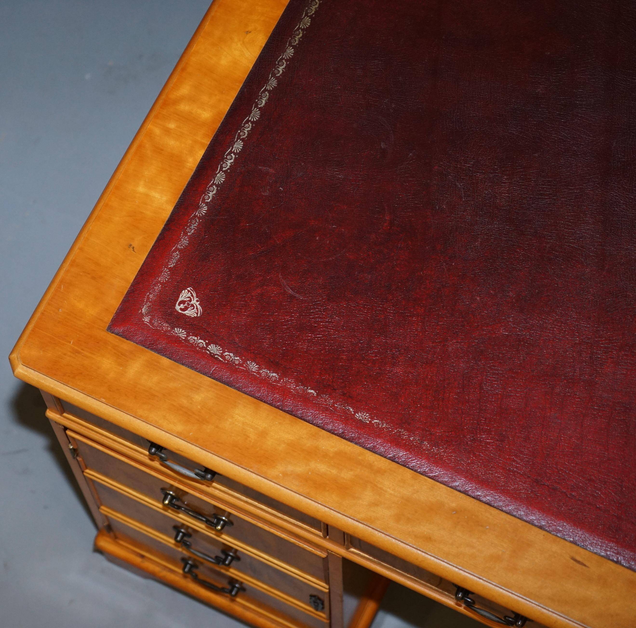 Vintage satin wood partner desk with leather top.