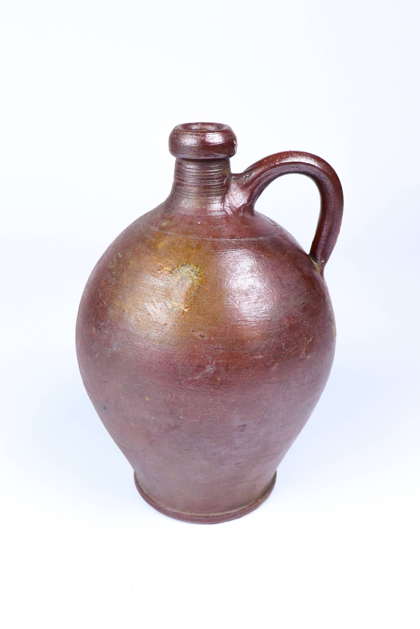 Old enamelled stoneware jug