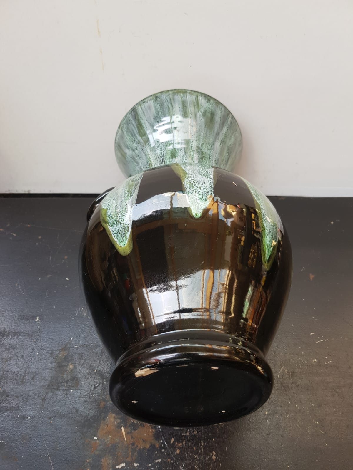 Old black enamelled ceramic Gaubier vase with green white vintage drips